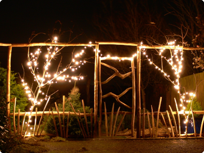 Bespoke fencing frames and gate decorated with lights